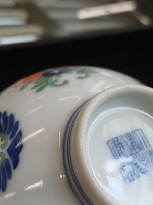 Lot 55 - A Chinese doucai 'honeysuckle' bowl, Qing dynasty, Daoguang mark and of the period