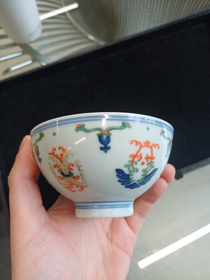 Lot 55 - A Chinese doucai 'honeysuckle' bowl, Qing dynasty, Daoguang mark and of the period