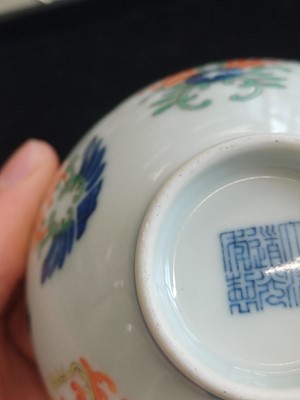 Lot 55 - A Chinese doucai 'honeysuckle' bowl, Qing dynasty, Daoguang mark and of the period