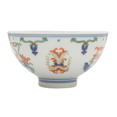 Lot 55 - A Chinese doucai 'honeysuckle' bowl, Qing dynasty, Daoguang mark and of the period