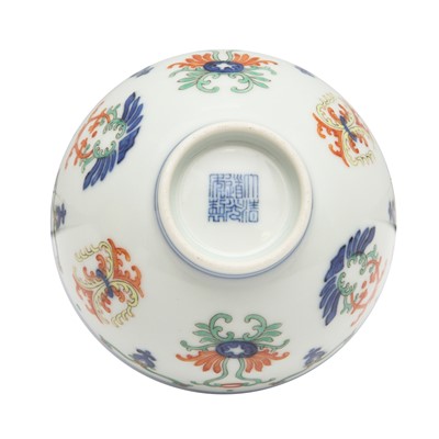Lot 55 - A Chinese doucai 'honeysuckle' bowl, Qing dynasty, Daoguang mark and of the period
