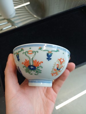 Lot 55 - A Chinese doucai 'honeysuckle' bowl, Qing dynasty, Daoguang mark and of the period
