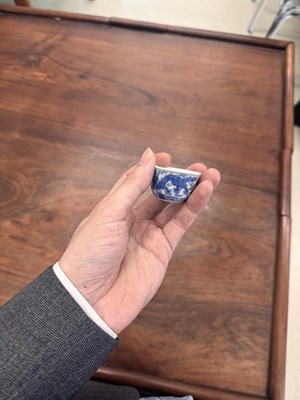 Lot 68 - Two Chinese blue and white 'dragon' cups, Qing dynasty, Guangxu period