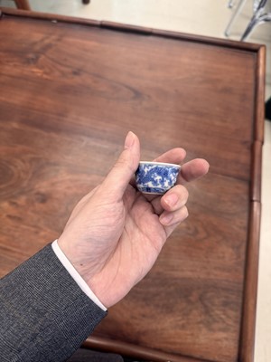 Lot 68 - Two Chinese blue and white 'dragon' cups, Qing dynasty, Guangxu period