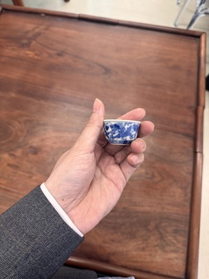 Lot 68 - Two Chinese blue and white 'dragon' cups, Qing dynasty, Guangxu period