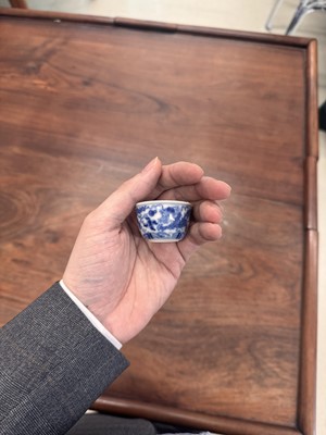 Lot 68 - Two Chinese blue and white 'dragon' cups, Qing dynasty, Guangxu period
