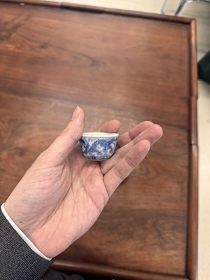 Lot 68 - Two Chinese blue and white 'dragon' cups, Qing dynasty, Guangxu period