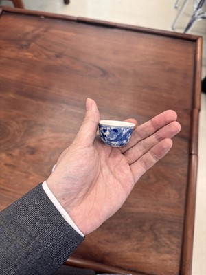 Lot 68 - Two Chinese blue and white 'dragon' cups, Qing dynasty, Guangxu period