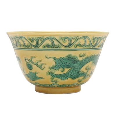 Lot 433 - A Chinese yellow-ground green-enamelled 'dragon' bowl, Republic period