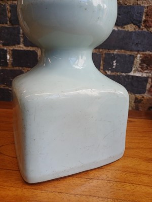 Lot 89 - A Chinese monochrome celadon-glazed vase, Qing dynasty, 19th century
