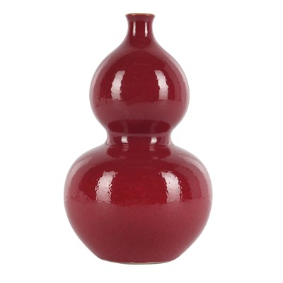 Lot 82 - A Chinese ruby-ground double-gourd vase, Qing dynasty, 19th century, Qianlong mark