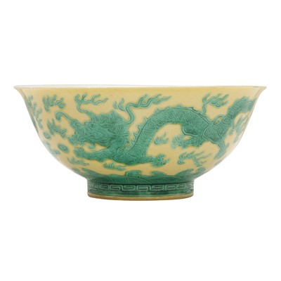 Lot 59 - A Chinese yellow-ground green-enamelled 'dragon' bowl, Qing dynasty, Tongzhi mark and of the period