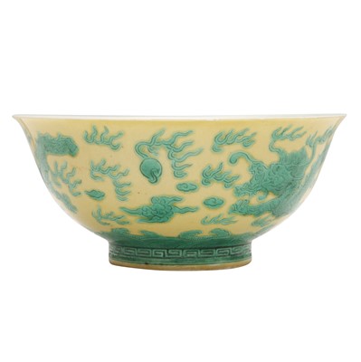 Lot 59 - A Chinese yellow-ground green-enamelled 'dragon' bowl, Qing dynasty, Tongzhi mark and of the period
