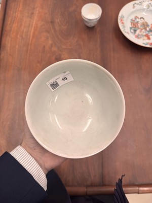Lot 59 - A Chinese yellow-ground green-enamelled 'dragon' bowl, Qing dynasty, Tongzhi mark and of the period