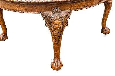 Lot 34 - A late Victorian figured walnut extending dining table by Maple & Co.