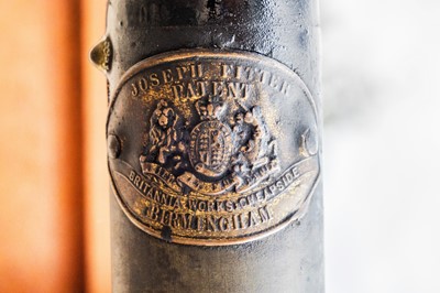 Lot 34 - A late Victorian figured walnut extending dining table by Maple & Co.