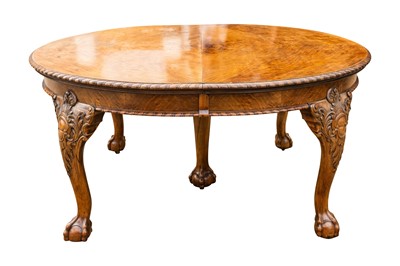 Lot 34 - A late Victorian figured walnut extending dining table by Maple & Co.