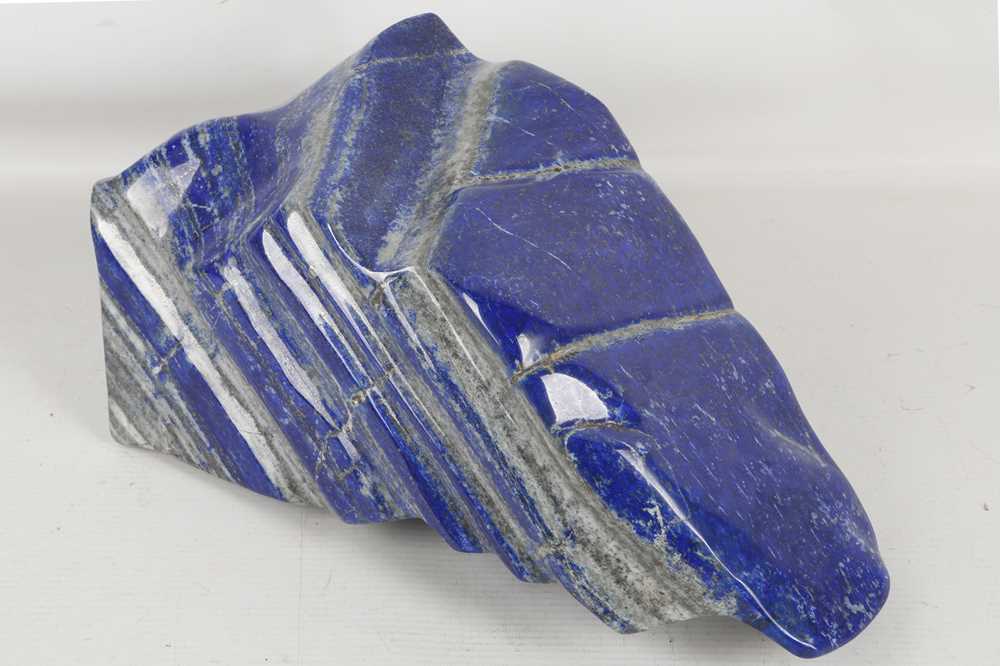 Lot 607 - A large polished lapis lazuli slab, 36cm.