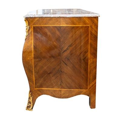 Lot 18 - A Louis XV marble topped crossbanded kingwood commode, circa 1770
