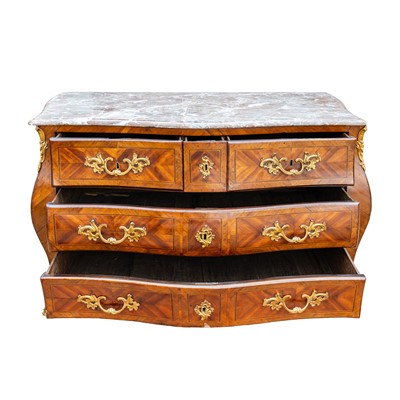 Lot 18 - A Louis XV marble topped crossbanded kingwood commode, circa 1770