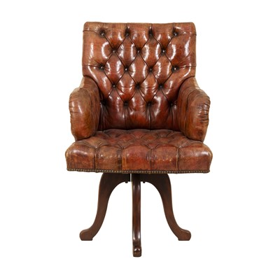 Lot 262 - An early 20th century leather armchair converted into an office chair