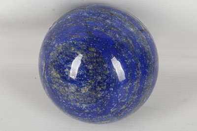 Lot 156 - A lapis lazuli sphere, 11cm diameter.
