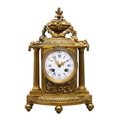 Lot 48 - A French Louis XVI style gilt bronze mantel clock