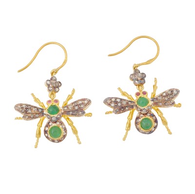 Lot 148 - A pair of gem set fly earrings