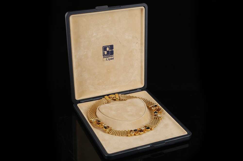 Lot 561 - A good Swarovski yellow metal and coloured...