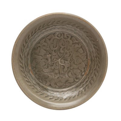 Lot 270 - A Chinese Yaozhou celadon-glazed moulded bowl, Song dynasty