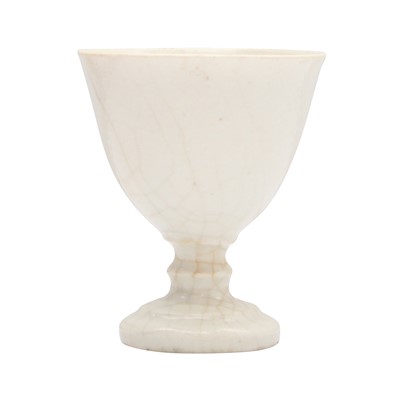Lot 251 - A Chinese white-glazed stem cup, possibly Sui - Tang dynasty