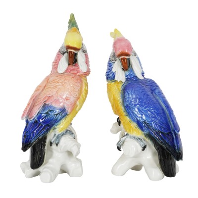 Lot 134 - A pair of Karl Ens porcelain parrots