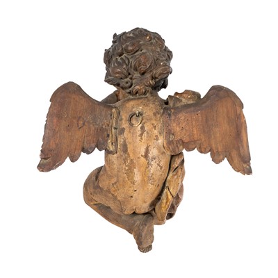 Lot 91 - A south German carved figure of a putto