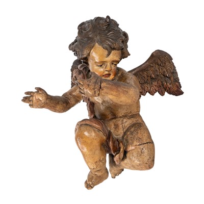 Lot 99 - A south German carved figure of a putto