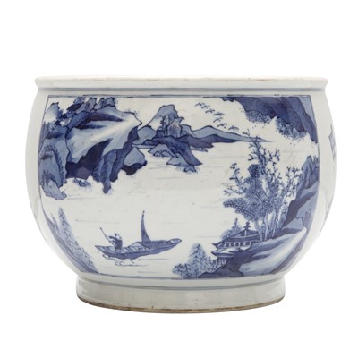 Lot 310 - A Chinese blue and white 'landscape' jardiniere, Qing dynasty, 18th century