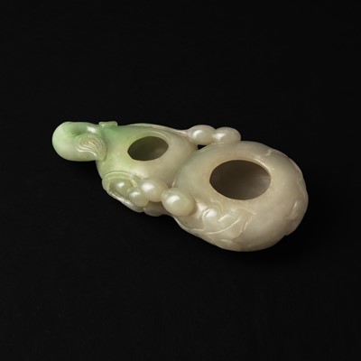 Lot 320 - A Chinese celadon jade 'double gourd' water pot, late Qing dynasty