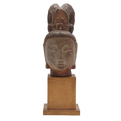 Lot 295 - A Chinese carved and painted stone head of Avalokiteshvara, Ming dynasty or earlier