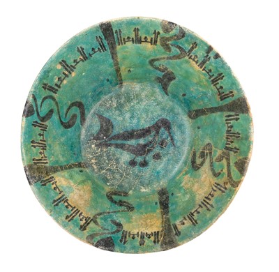 Lot 146 - A Kashan underglaze-painted pottery bowl Persia, 12th/ 13th Century