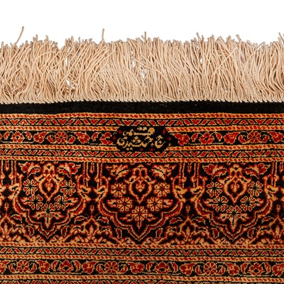 Lot 84 - An extremely fine & signed silk Qum rug, central Persia