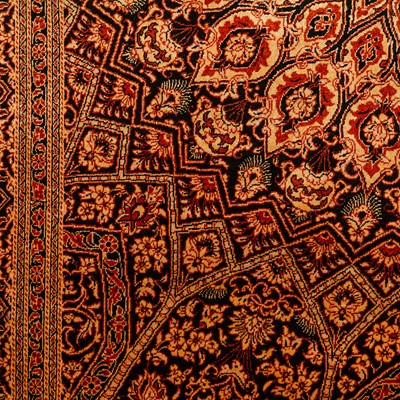 Lot 84 - An extremely fine & signed silk Qum rug, central Persia