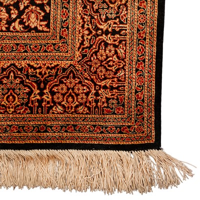 Lot 84 - An extremely fine & signed silk Qum rug, central Persia