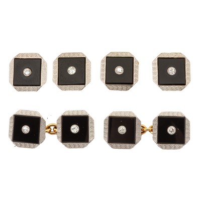 Lot 130 - A set of onyx and diamond cufflinks and dress studs