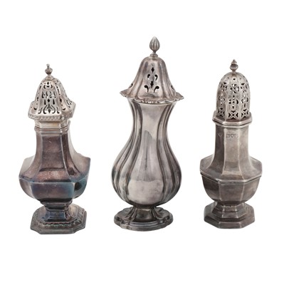 Lot 508 - Three George V and later sterling silver sugar casters