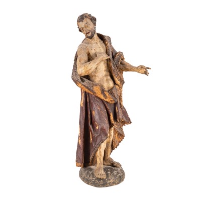 Lot 98 - A polychrome painted limewood figure of Saint John The Baptist