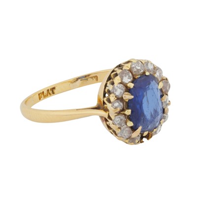 Lot 42 - A sapphire and diamond halo ring