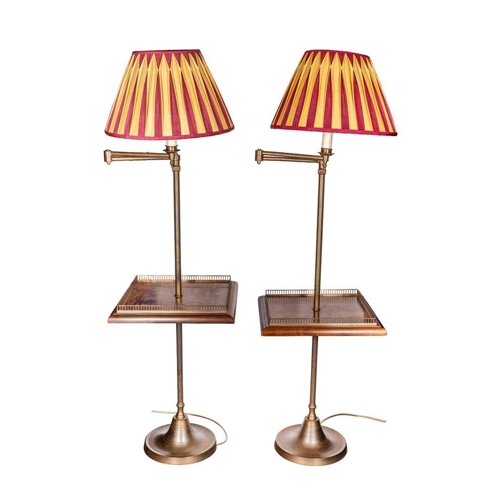Lot 84 - A pair of mahogany and brass reading lamp tables
