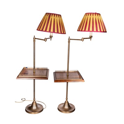 Lot 84 - A pair of mahogany and brass reading lamp tables