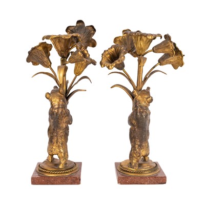 Lot 71 - A pair of Continental ormolu candlesticks, late 19th century