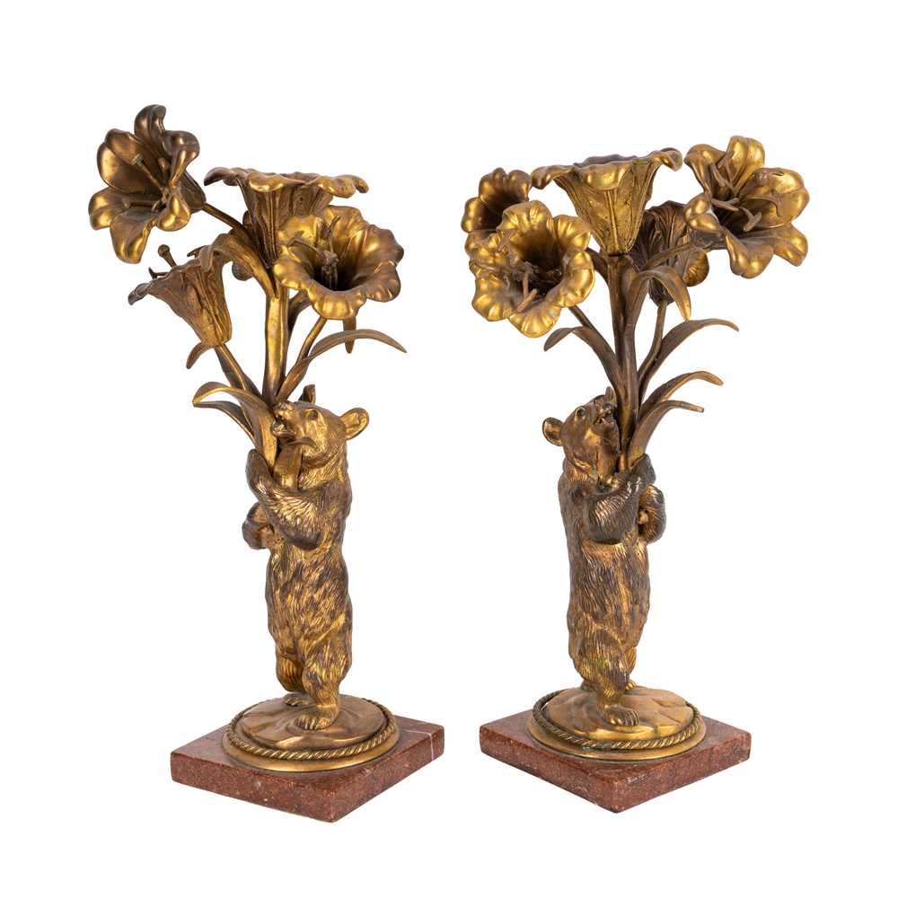 Lot 71 - A pair of Continental ormolu candlesticks, late 19th century