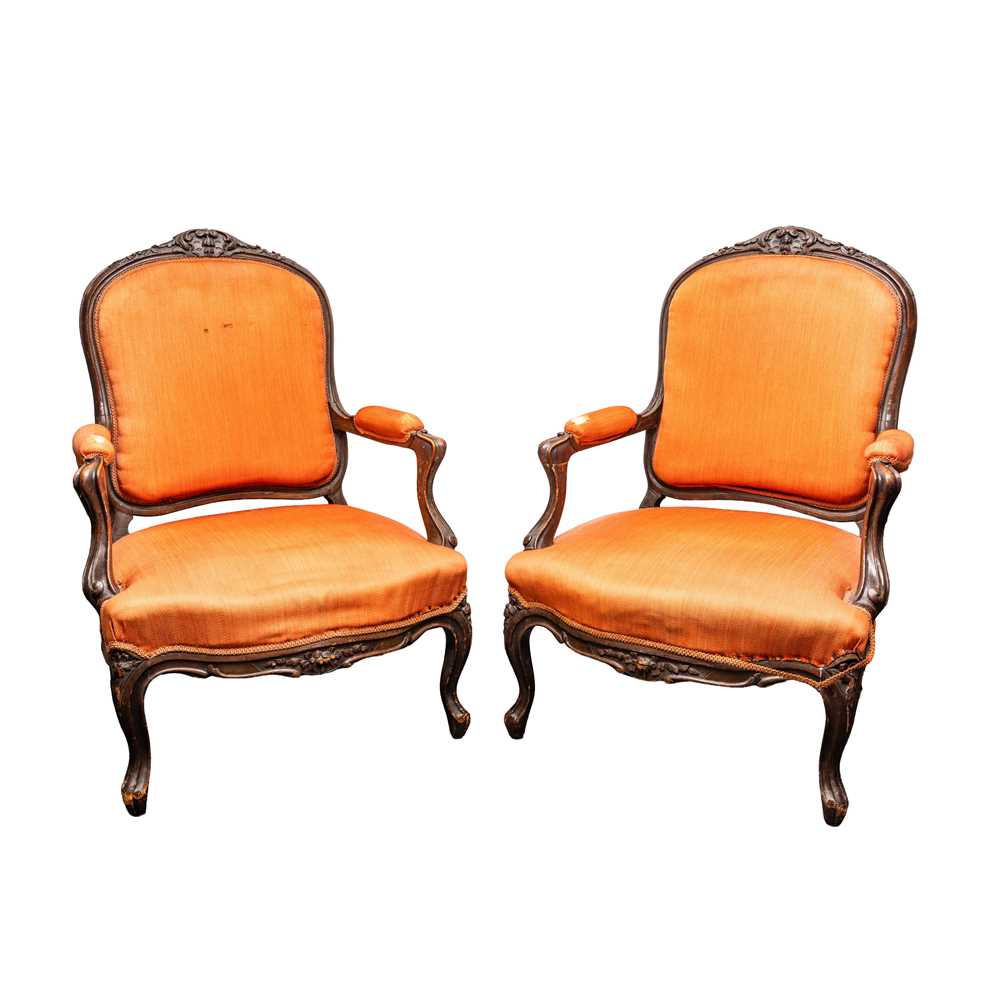 Lot 5 - A pair of Louis XV style walnut fauteuil armchairs, late 19th century